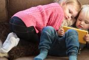 Children read tablet