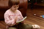 Children read tablet