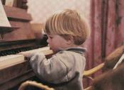 Child playing piano